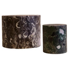Two cylindrical colored marble specimens - Lumachella and verde antico