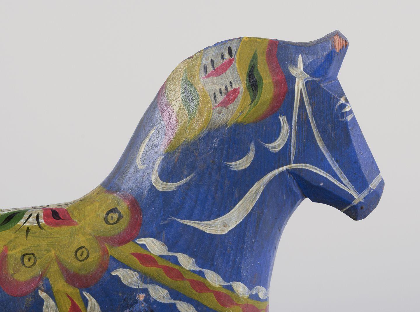 20th Century Two Dala horses. Hand-painted with floral motifs on a blue background. Folk art. For Sale