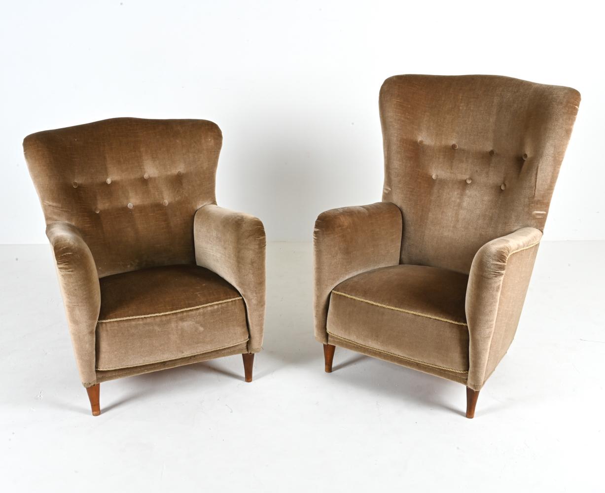 Transport yourself to the heart of mid-century Denmark with our captivating pair of Danish Easy Chairs, reminiscent of the artistry and elegance of Frits Henningsen's iconic designs. Curated from the charismatic 1950's, these chairs capture the