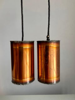 Due pendenti moderni danesi a cilindro in rame brutalista, anni '60