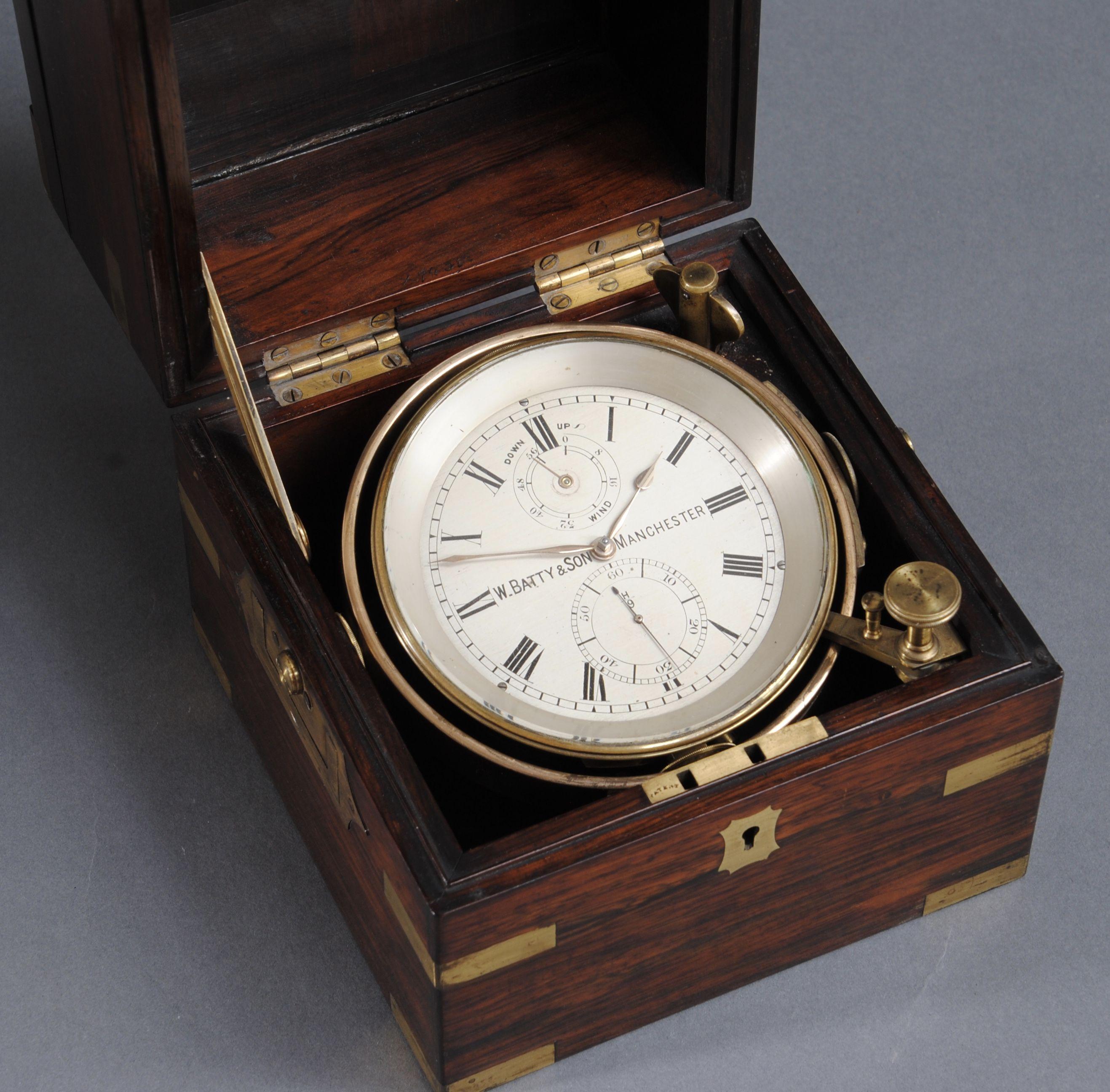 A two day marine chronometer by Batty and sons, Manchester housed in a brass bound rosewood case with gimbals , all retaining the original lacquer. 
The two day movement of fine quality, all fully cleaned and running well. 

Batty is listed in