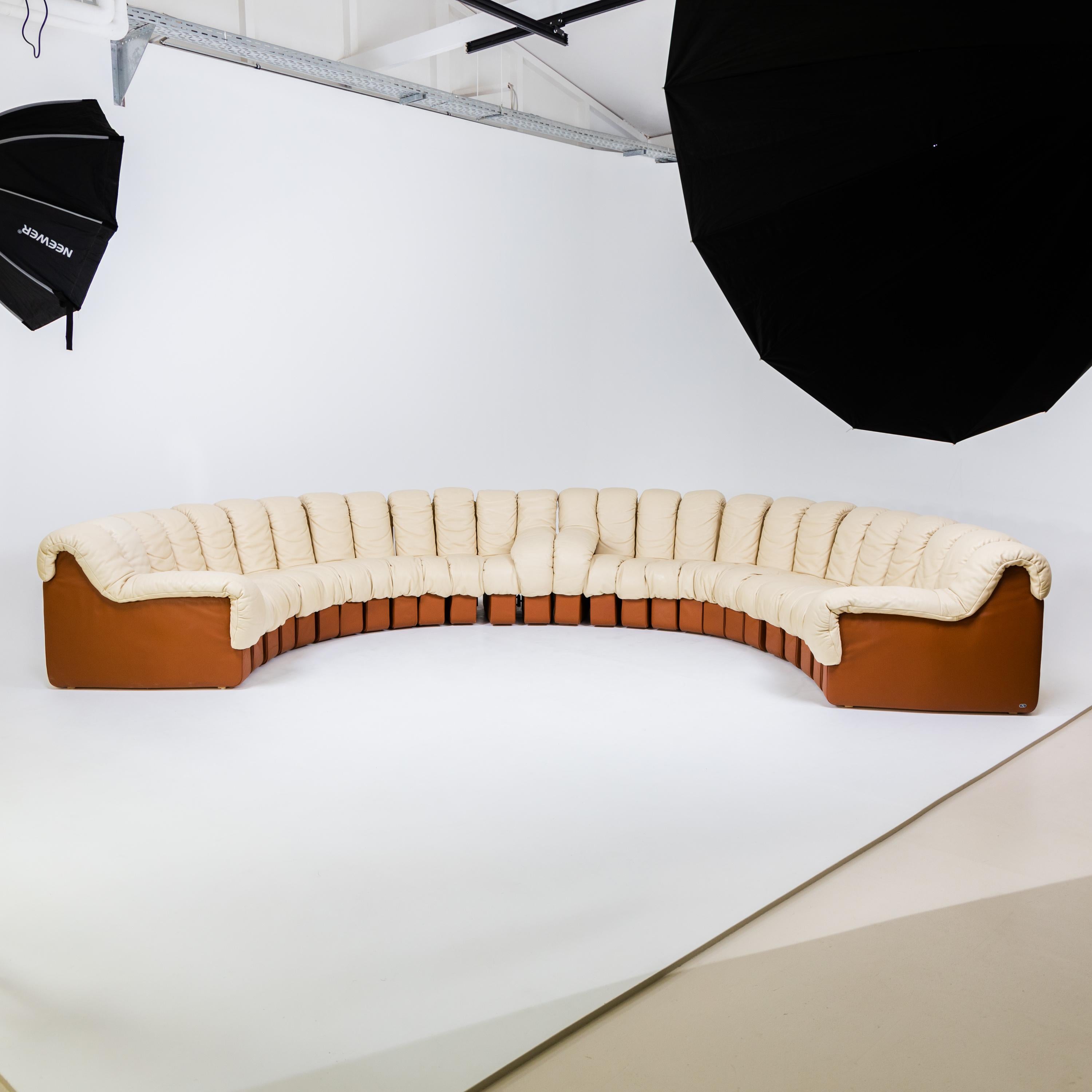 Pair of De Sede sofas, model DS600, designed by Eleanora Peduzzi-Riva, Heinz Ulrich, Ueli Berger and Klaus Vogt for De Sede in 1972. The two sofas consist of 13 elements each with armrests at the ends and are upholstered in a beige and brown