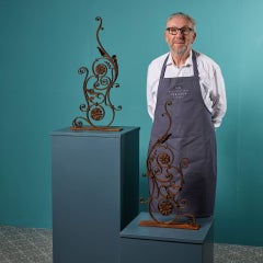 Two Decorative Wrought Iron Scrolling Brackets