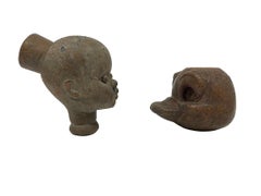 Two doll head molds from the mid-20th century