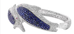 Two Dolphin Blue Sapphire and 15 Carat Diamond Bangle in 18 Karat White Gold