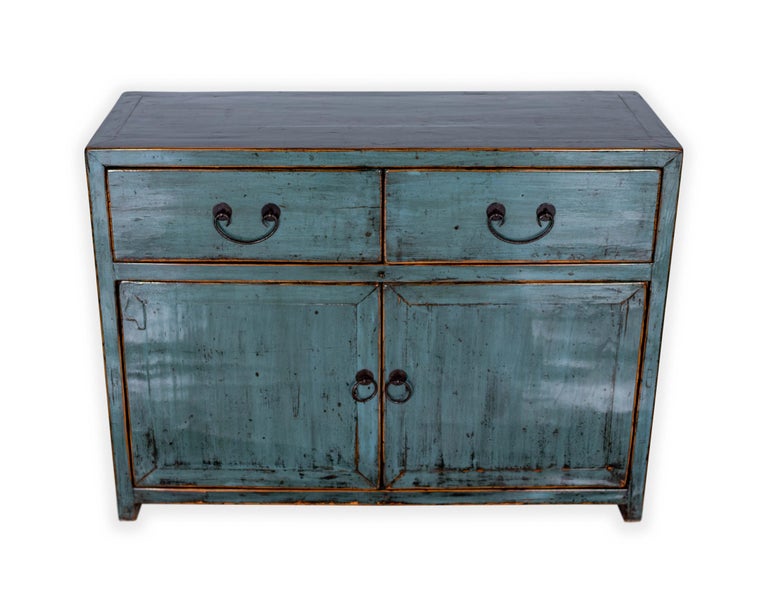 Two door cabinet in lacquer blue patina.