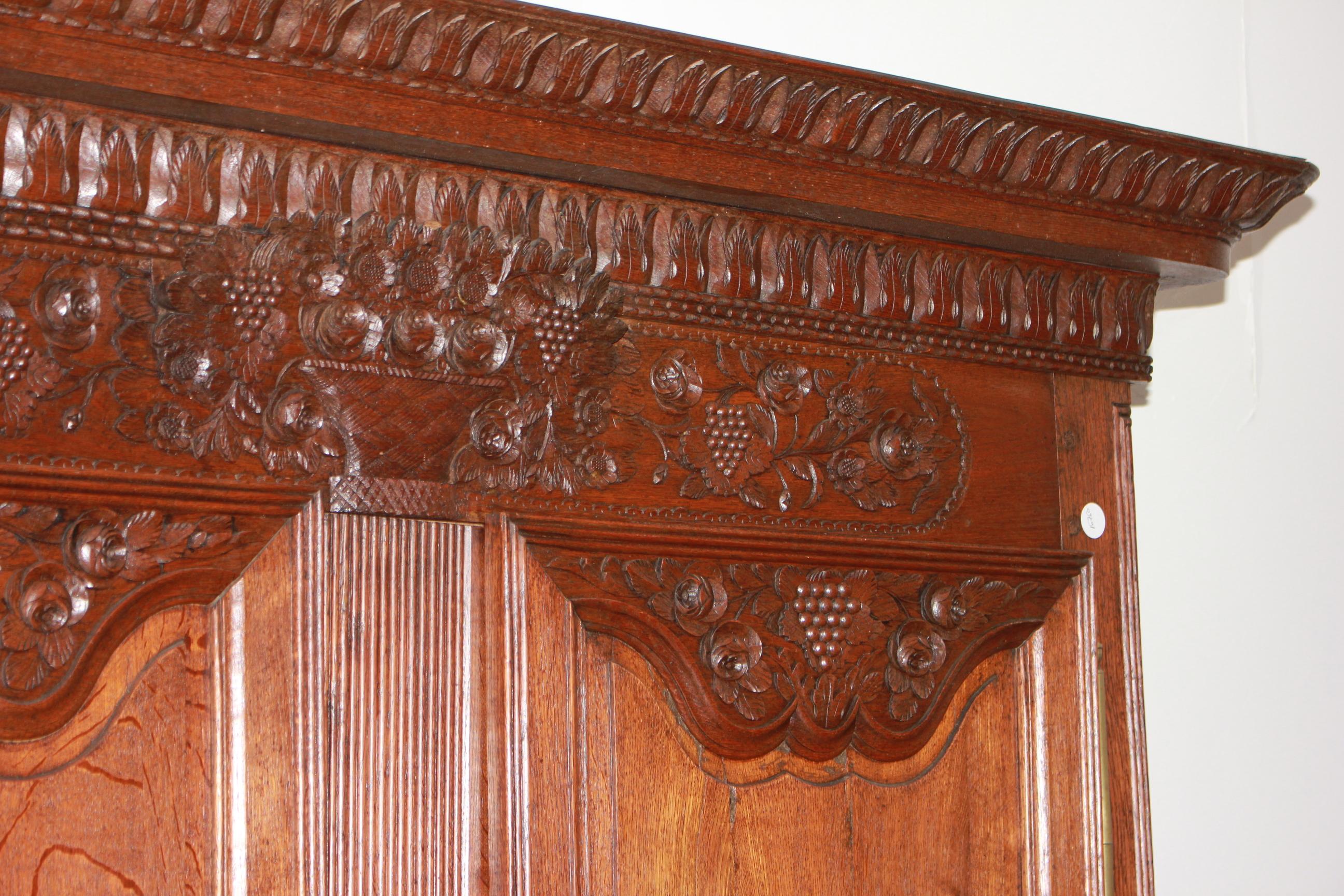 French Two-Door Carved Normandy Wardrobe, France 18th Century For Sale