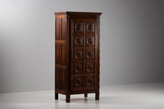 Two-Door Dark Oak Armoire with Carved Rosette Medallions, France, 1950s