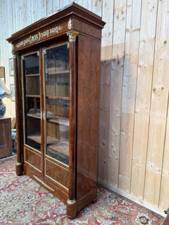 Two-door display bookcase – Empire period – Mahogany veneer, gilded bronzes