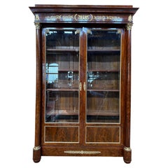 Two-door display bookcase – Empire period – Mahogany veneer, gilded bronzes