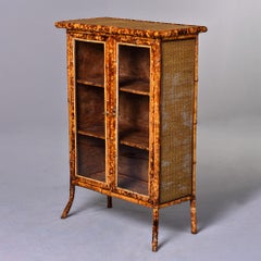 Two Door Glass Front Cabinet with Spotted Bamboo Frame