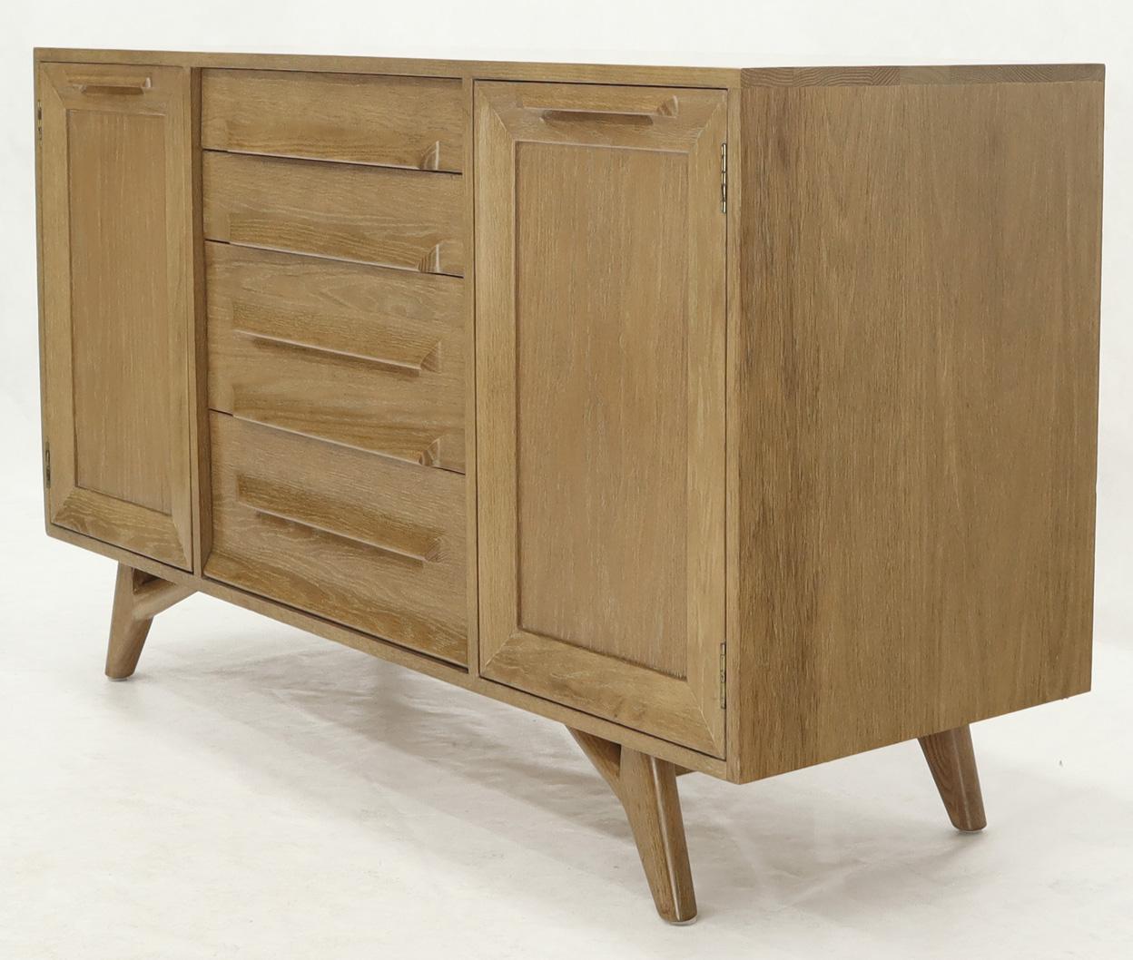 Mid-Century Modern cerused or limed oak finish solid board server sideboard cabinet. Organic shape legs. In style of or attributed to Brown and Saltman. The pair is rock solid made out of solid oak bard. Priced individually.