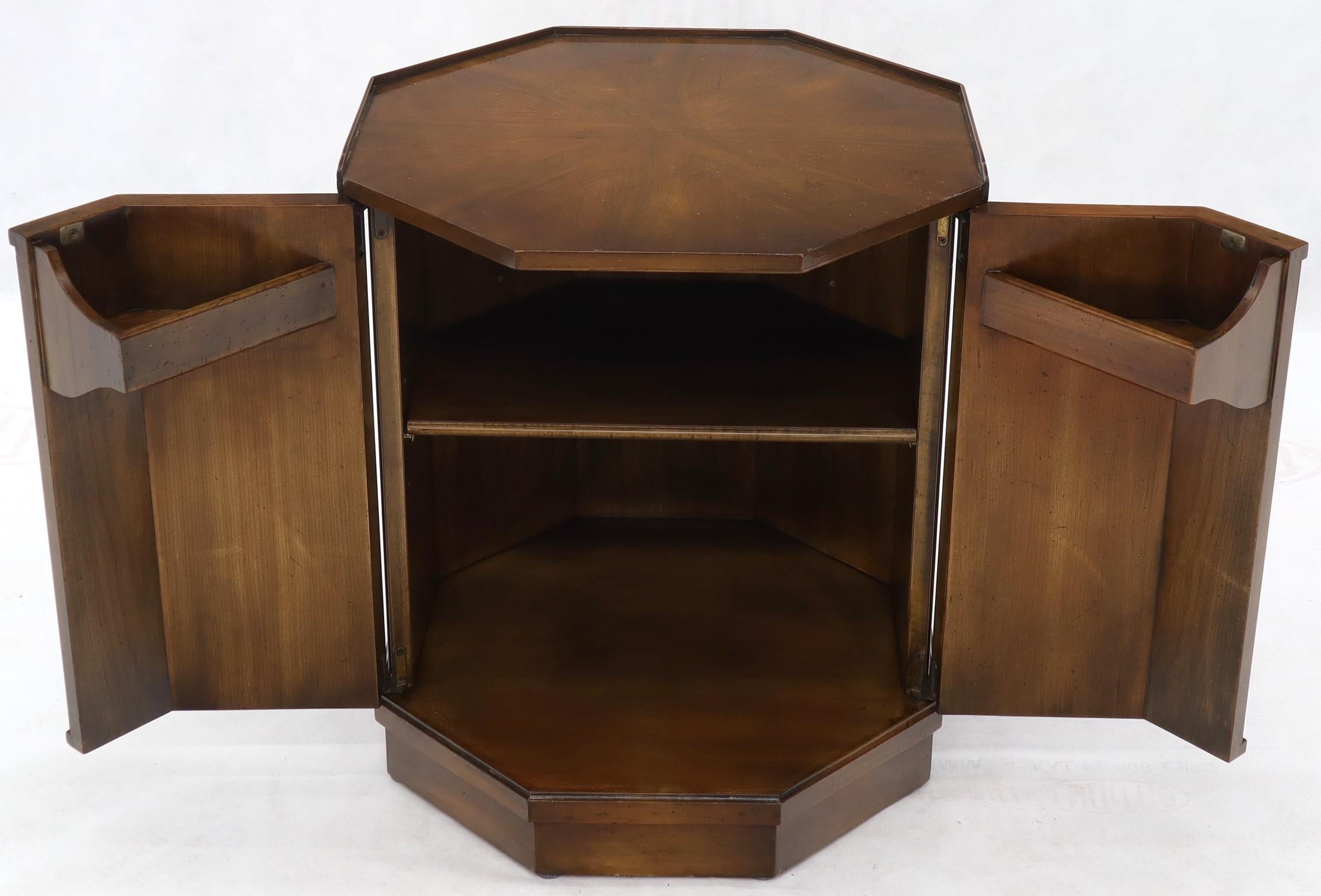 Mid-Century Modern walnut gallery edges octagon shape two-door cabinet stand.