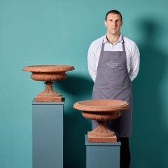 Two Doulton Terracotta Tazza Urns