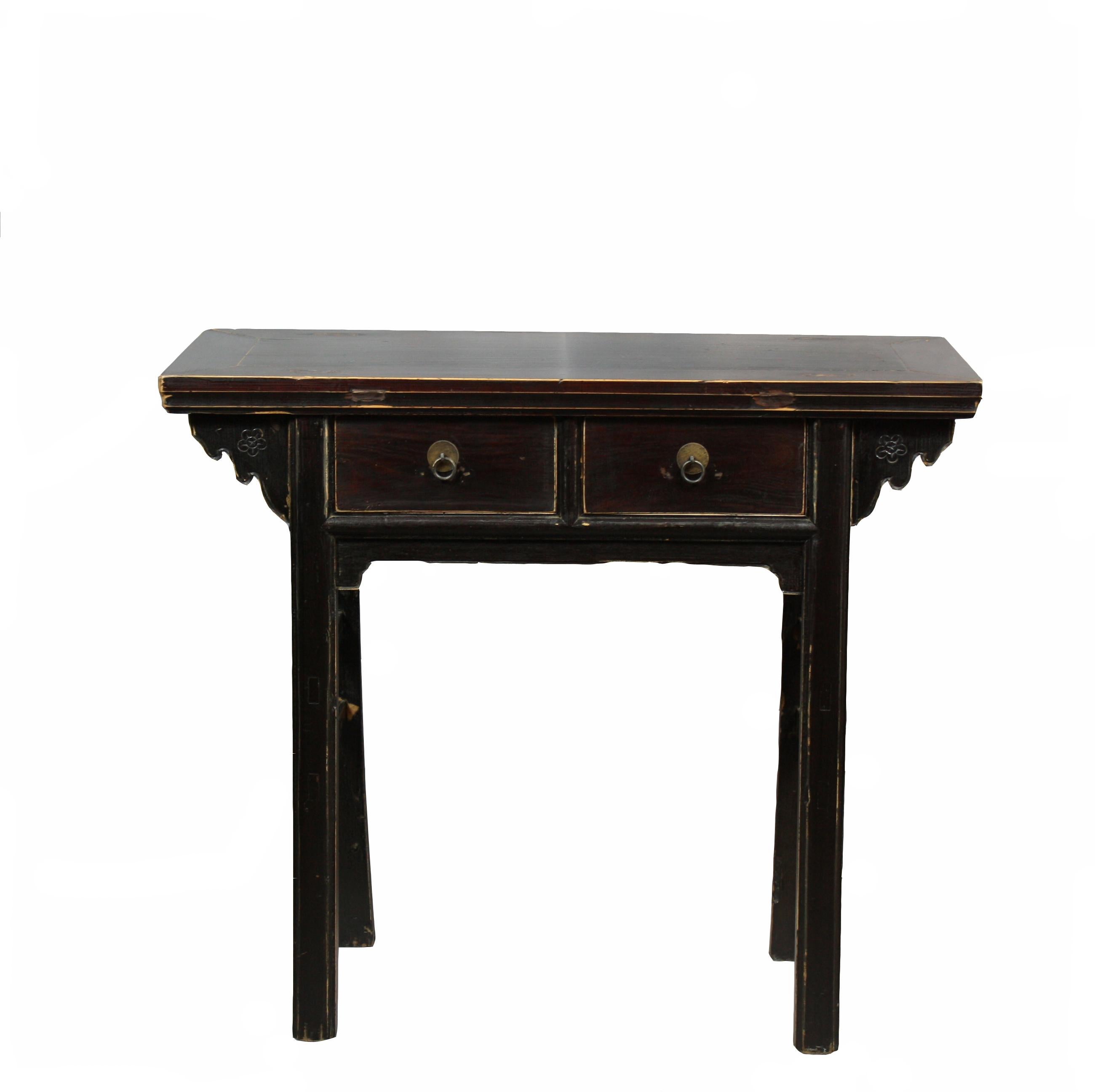 Straight legs, aged black lacquer paint with red hue, and cloud shaped carving on the top of two sides makes this lovely table a perfect antique Asia accent table in the living room, hall way, or a small blanket space.