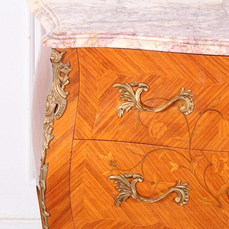 Two-drawer inlaid commode with marble top and brass mounts.