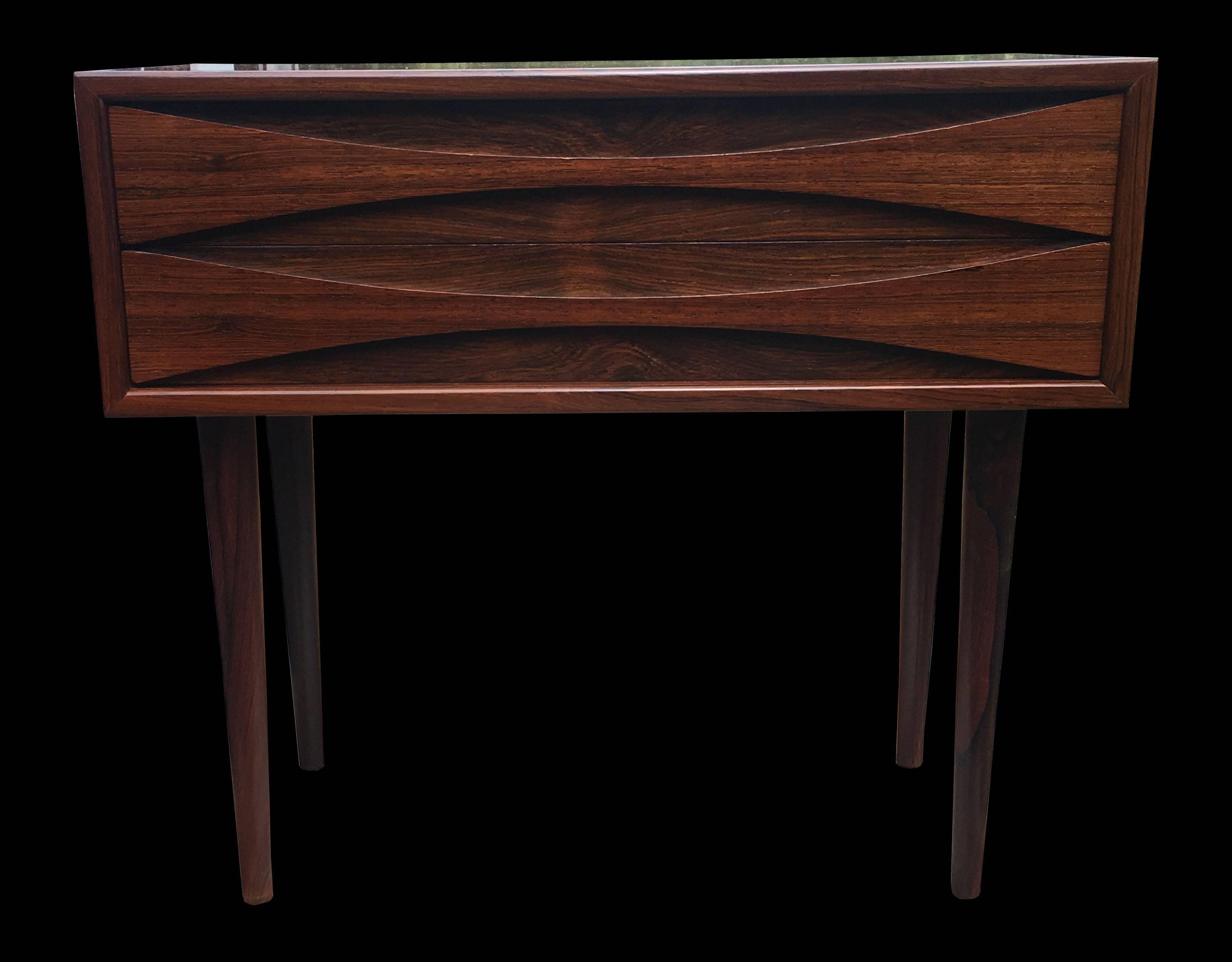 An unusual 60 cm wide version of this highly priced item by Arne Vodder in very nicely figured rosewood and in great condition.