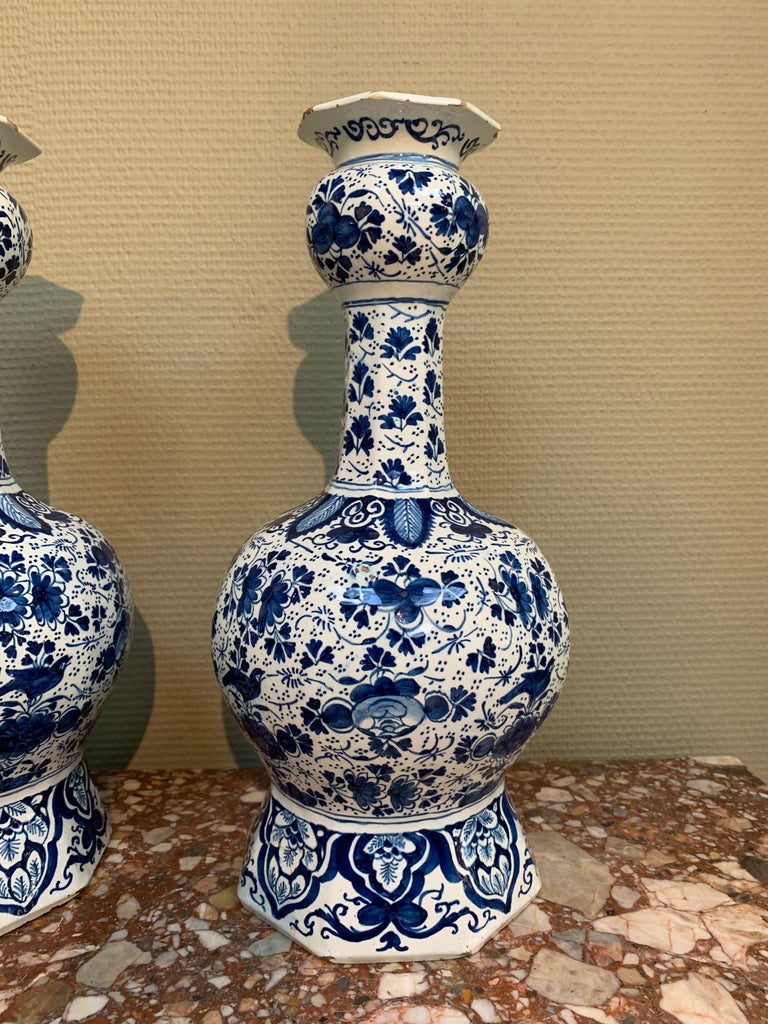 Glazed Two Dutch Delft Baluster Vases with Floral Decor of Roses and Leaves For Sale