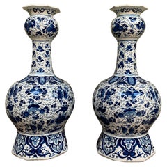 Two Dutch Delft Baluster Vases with Floral Decor of Roses and Leaves