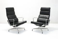 Two EA222 Soft Pad Highback Lounge Chairs by Charles and Ray Eames for Vitra