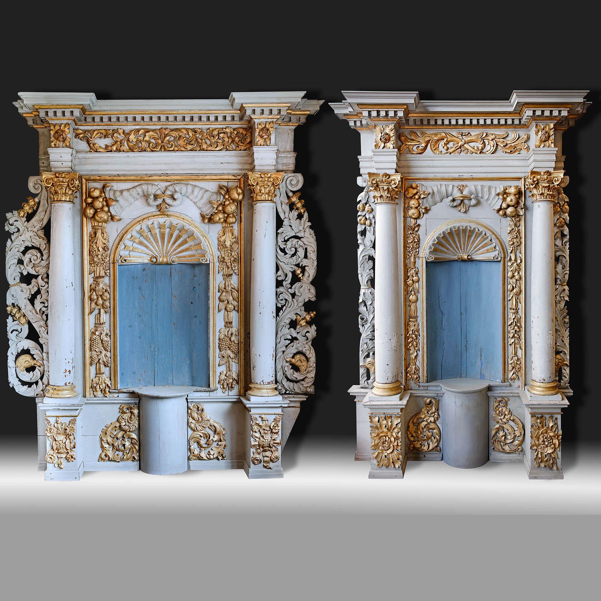 Two early seventeenth-century French chapel niches made of carved oak, gilded with gold leaf and executed in the classicist design language.

The niches are each provided with a pair of columns with capitals decorated in the richest Composite style