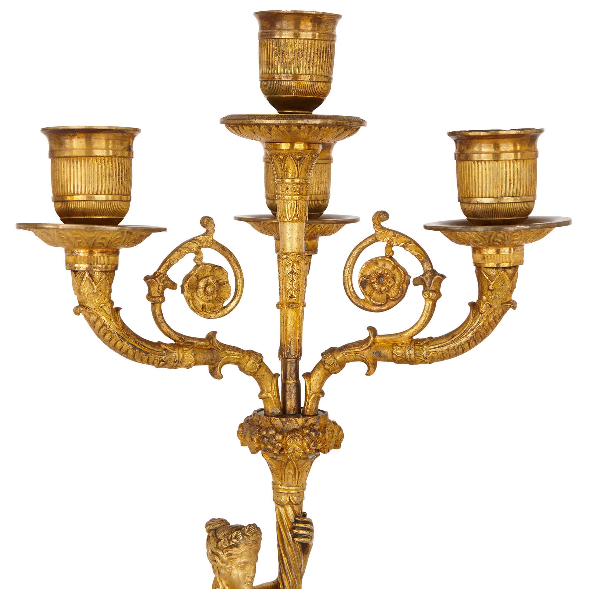 Vergoldete Bronzekandelaber aus dem französischen Empire des frühen 19. Jahrhunderts im Angebot 1