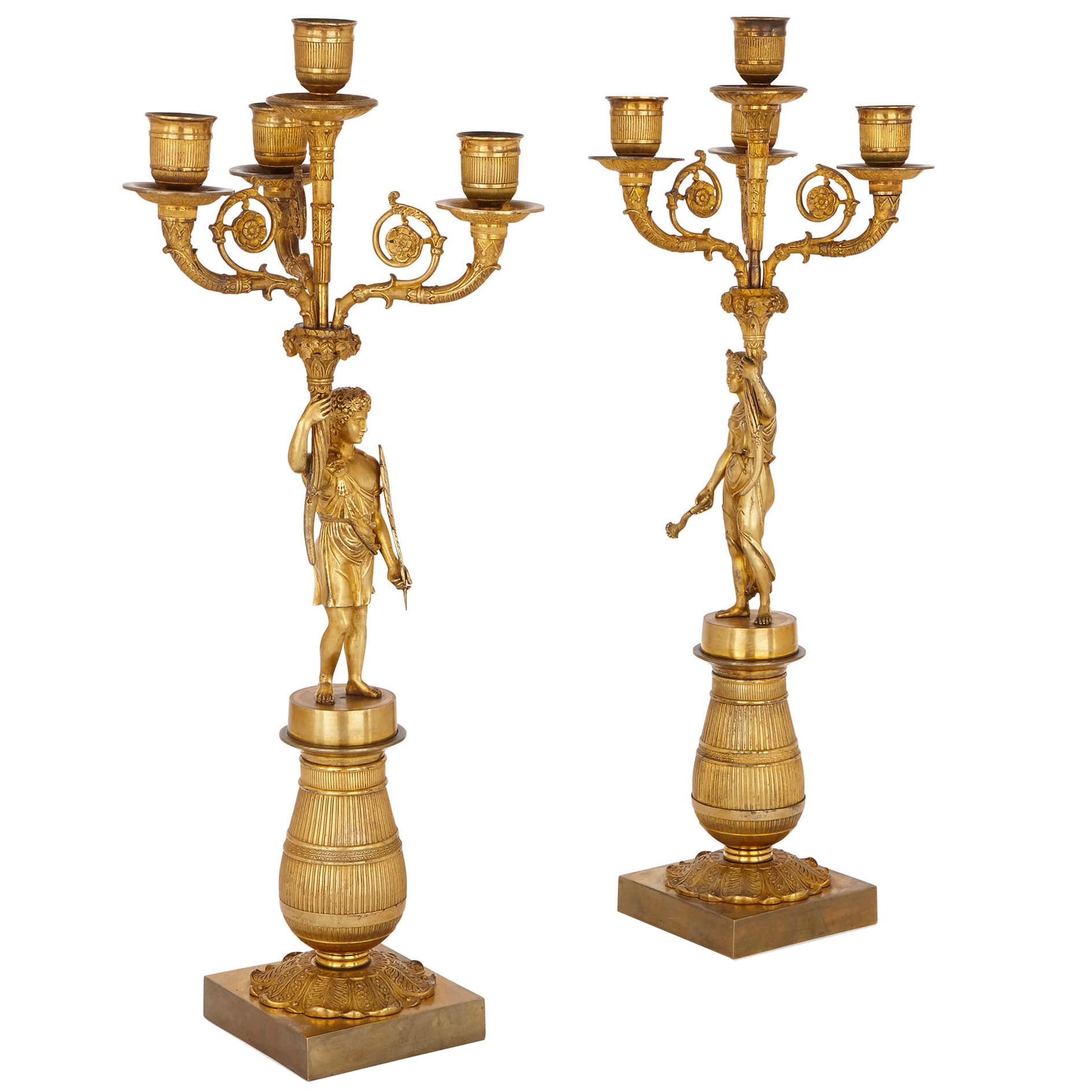 Due candelabri in bronzo dorato stile impero francese dei primi del XIX secolo
