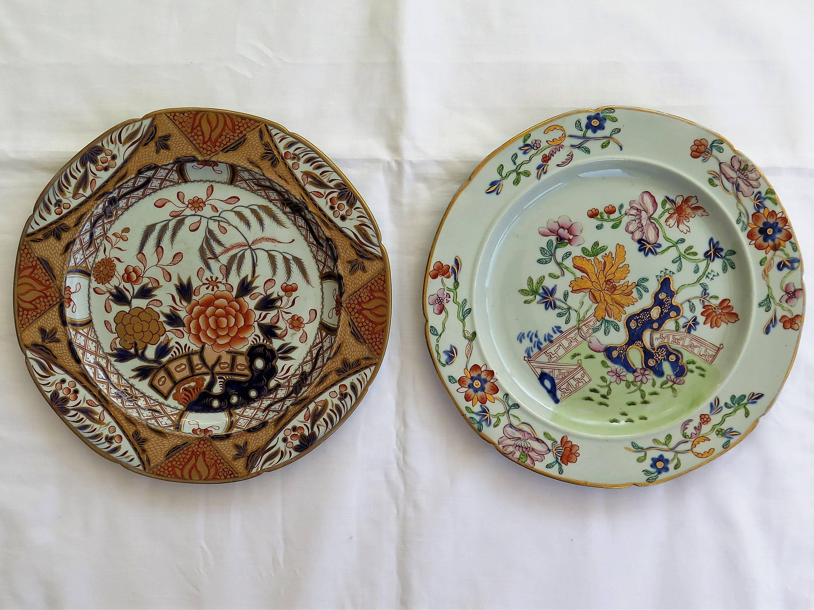 These are two beautiful, heavily gilded Mason's ironstone plates, dating to the earliest period between 1813 and 1820.

The plates are the same nominal size and shape, but have different patterns and base marks as follows; 

Left hand side: