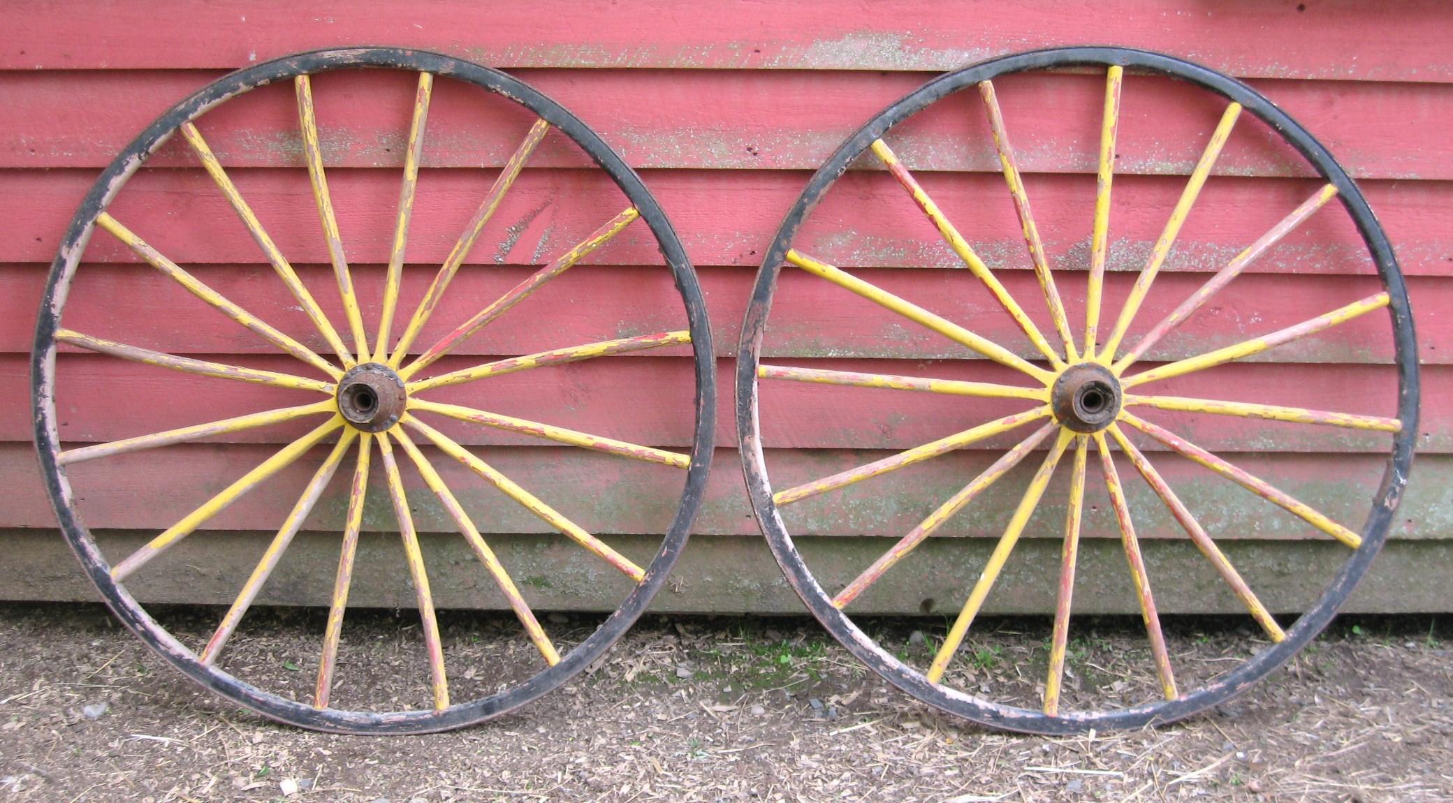 Primitive Two Early Painted Wood and Metal Wagon or Fire Engine Wheels For Sale