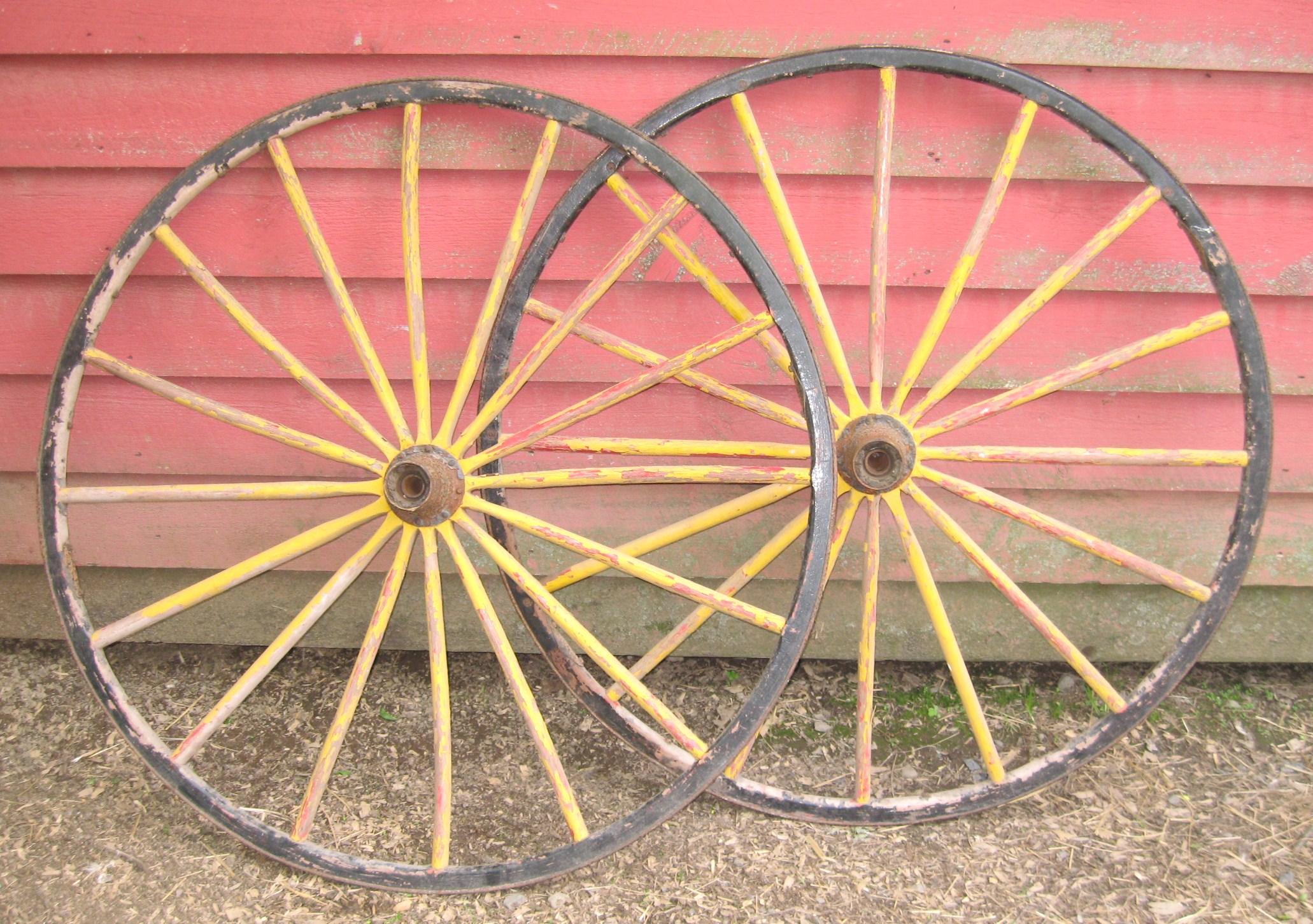 Primitive Two Early Painted Wood and Metal Wagon or Fire Engine Wheels For Sale