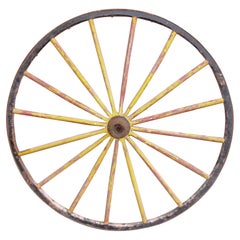 Two Early Painted Wood and Metal Wagon or Fire Engine Wheels