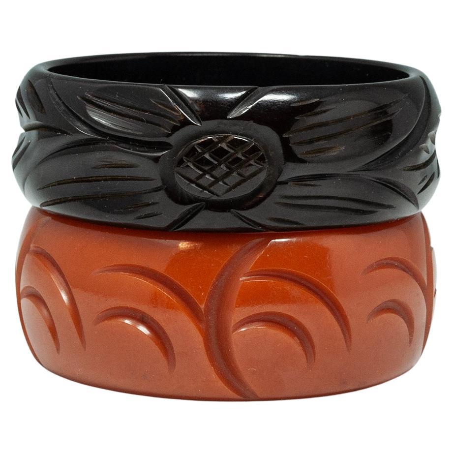 Dos pulseras de baquelita de principios a mediados del siglo XX en venta