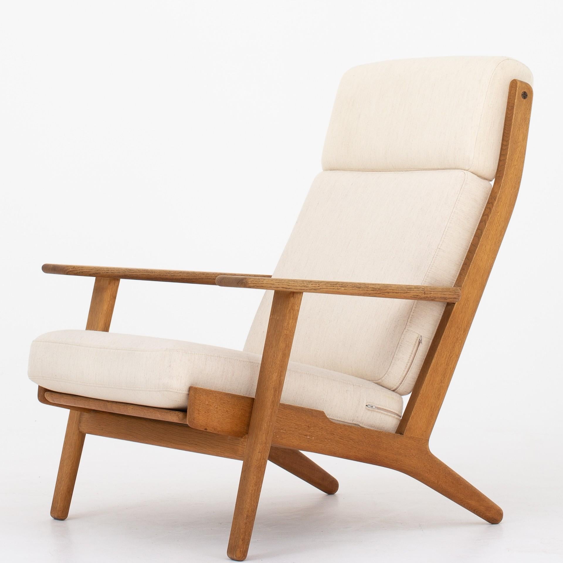 GE 290A - Easy chairs in patinated oak with original cushions in savak wool. Maker GETAMA. 1953.