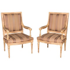 Two Elegant French Armchairs in the antique Louis Seize Style beech hand carved