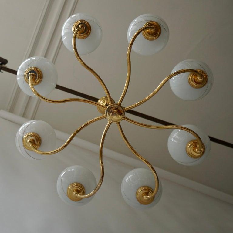 Eleganza dei lampadari italiani di metà secolo in ottone e vetro, anni '70 - Più pezzi disponibili

Splendida collezione di lampadari italiani della metà degli anni '70, realizzati in ottone dai toni caldi e con globi di vetro opalino soffiato a