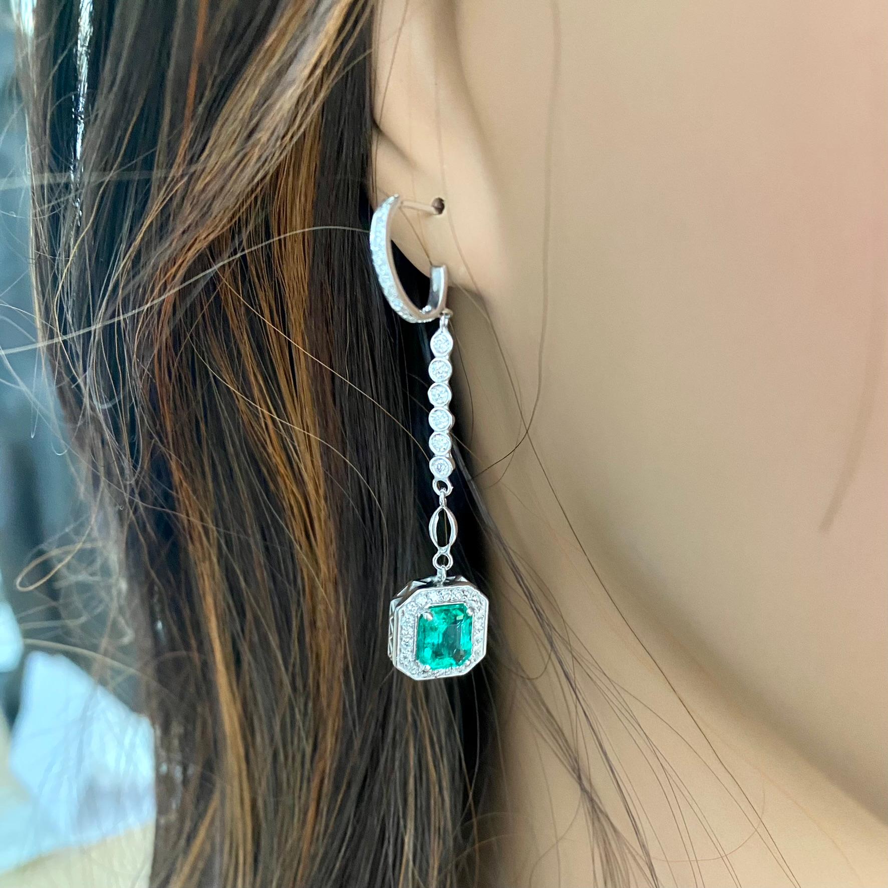 Emerald Shaped Emeralds Halo Diamond 3.50 Carat Lariat Gold 2.20 Inch Earrings For Sale 7