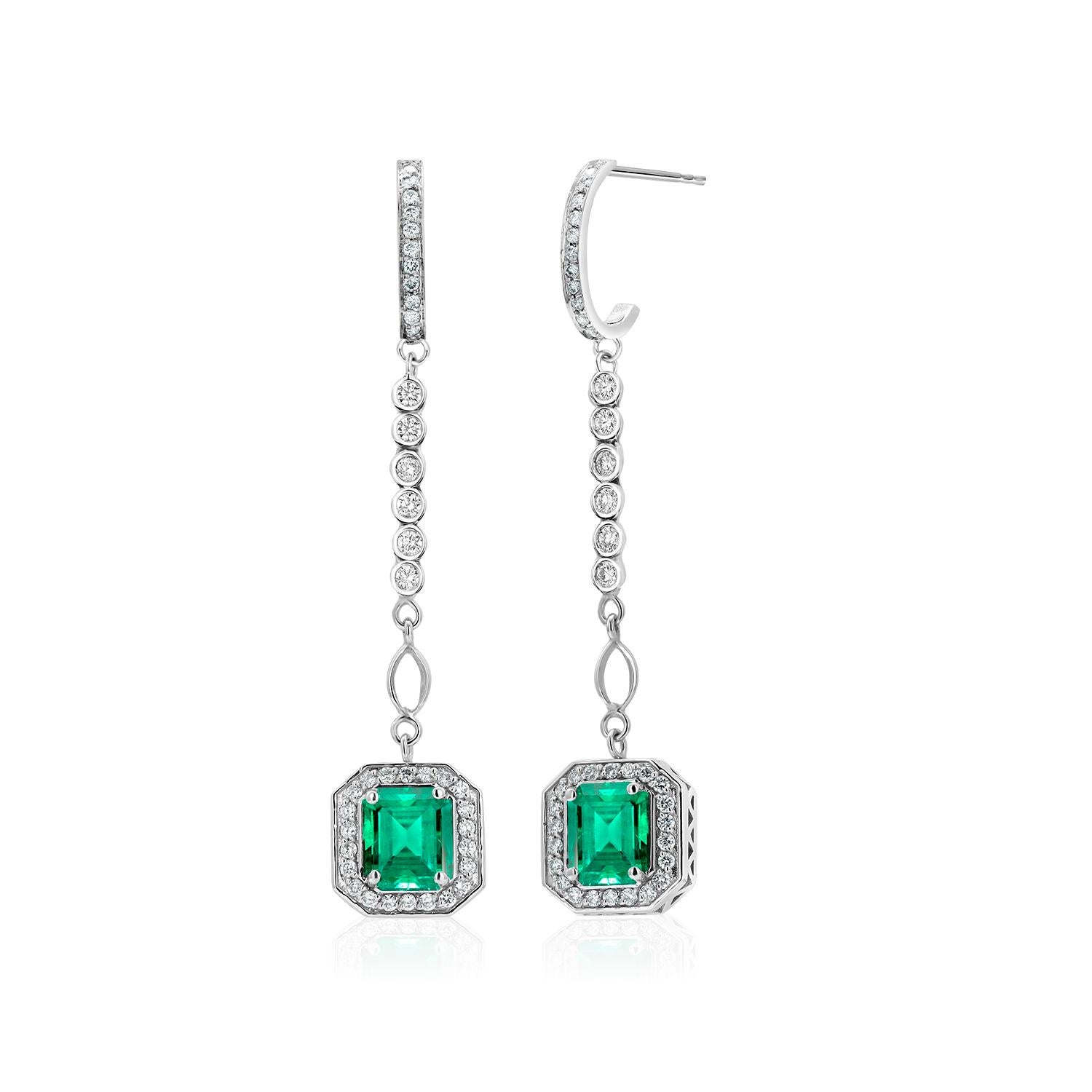 Emerald Shaped Emeralds Halo Diamond 3.50 Carat Lariat Gold 2.20 Inch Earrings For Sale 2