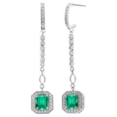 Emerald Shaped Emeralds Halo Diamond 3.50 Carat Lariat Gold 2.20 Inch Earrings