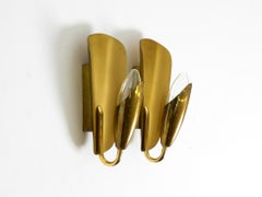 Two enchanting original Swedish Mid Century Modern brass wall lamps