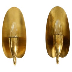 Two enchanting original Swedish Mid Century Modern brass wall lamps