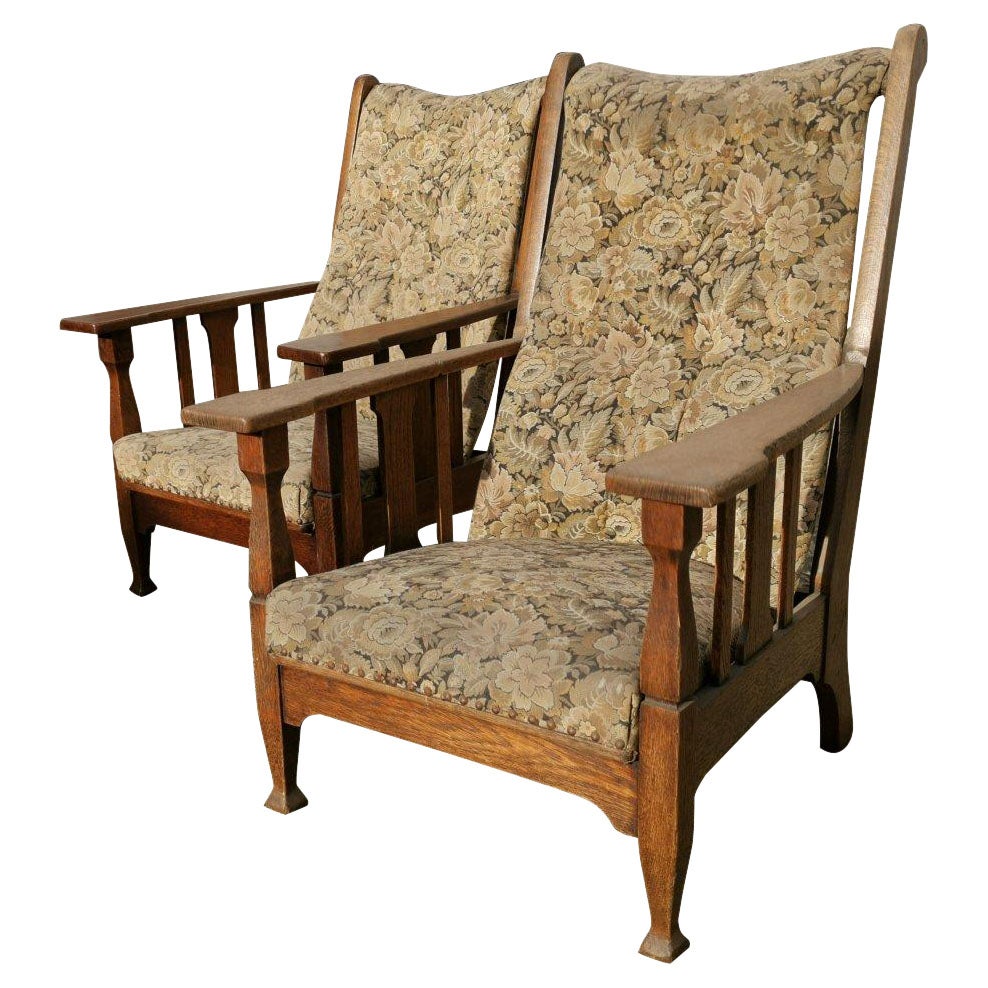 Two English Arts & Crafts Oak Reclining Armchairs with Large Flat Extended Arms