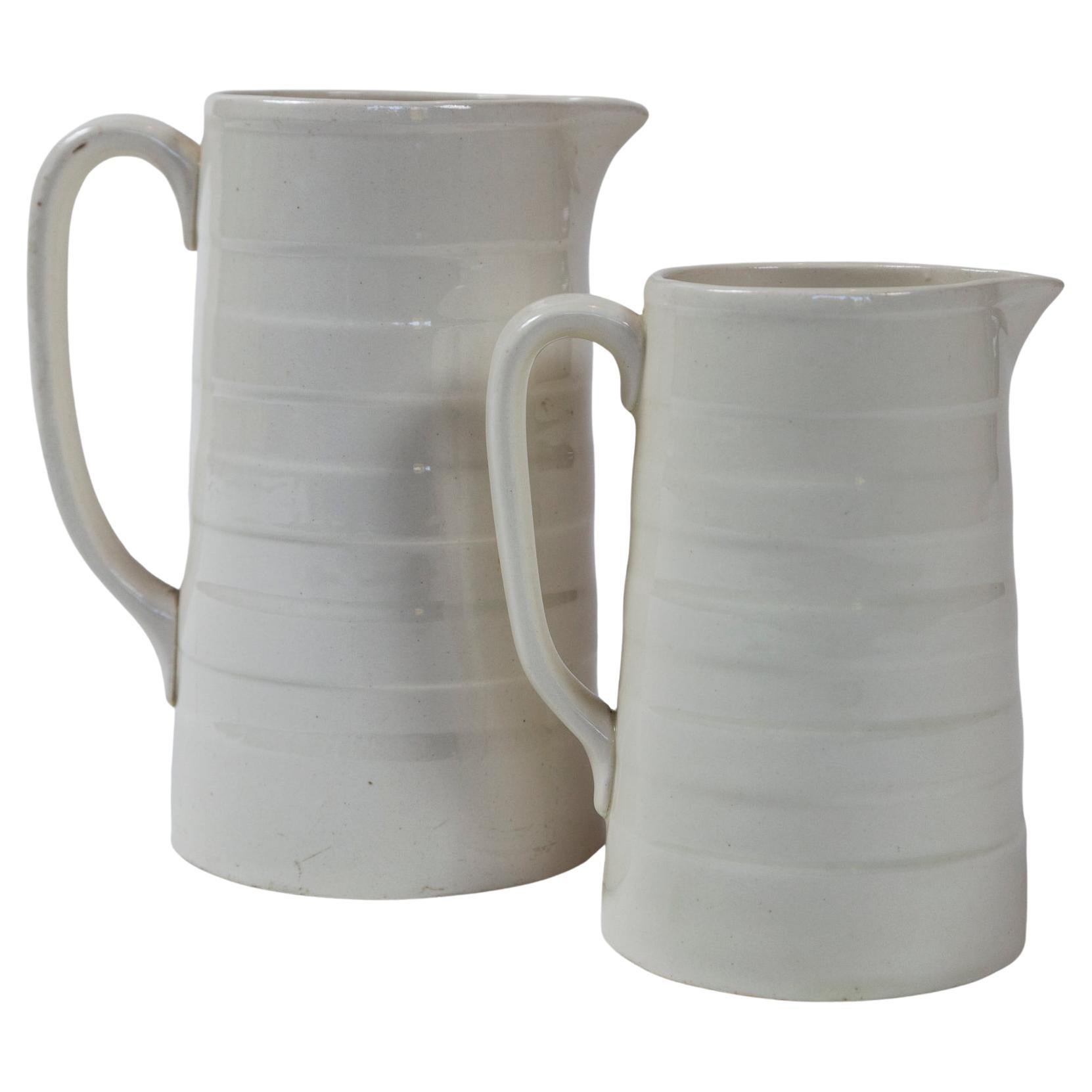 Two English Ironstone Dairy Pitchers, circa 1920 For Sale