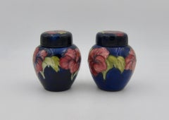 Two English Moorcroft Pottery Ginger Jars in Blue Hibiscus Pattern