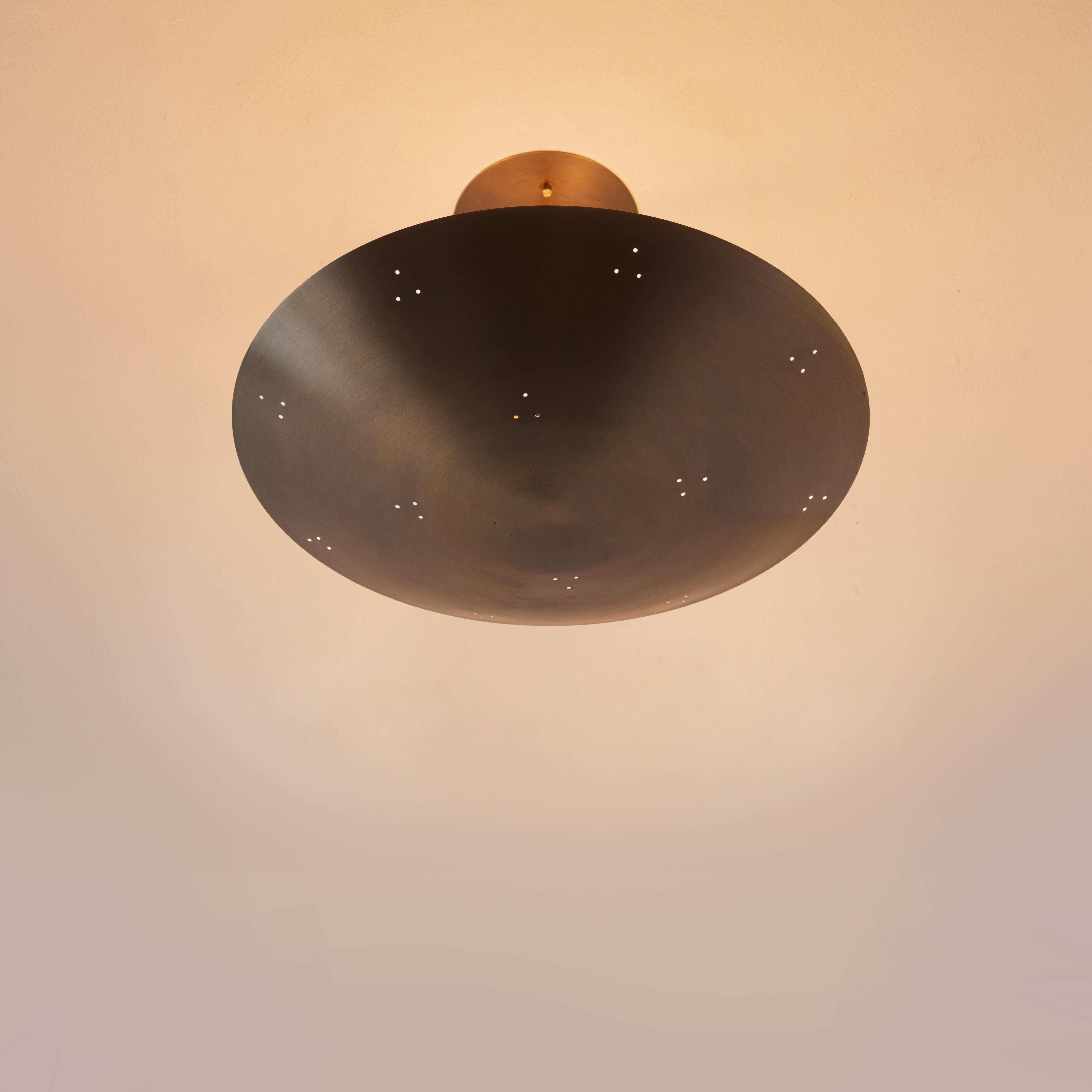 Two Enlighten 'Rey 14' Perforated Patinated Brass Dome Ceiling Lamp.

Hand-fabricated in Los Angeles, these highly refined ceiling lamps are reminiscent of the iconic mid-century Finnish designs of Paavo Tynell and Lisa Johansson Pape. Executed in