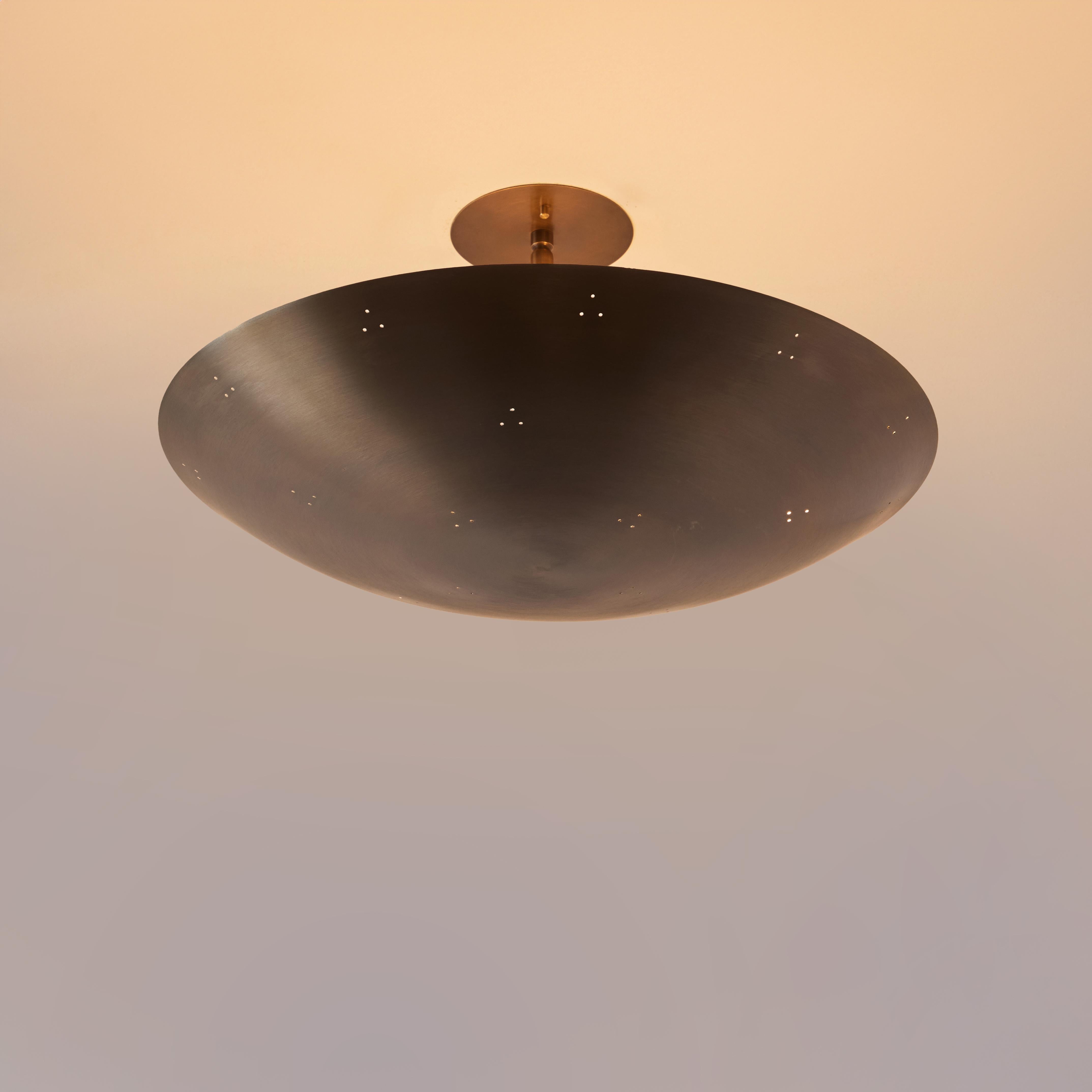 Raul Reyes 'Rey 20' Perforated Patinated Brass Dome Ceiling Lamp.

Hand-fabricated in Los Angeles, these highly refined ceiling lamps are reminiscent of the iconic mid-century Finnish designs of Paavo Tynell and Lisa Johansson Pape. Executed in