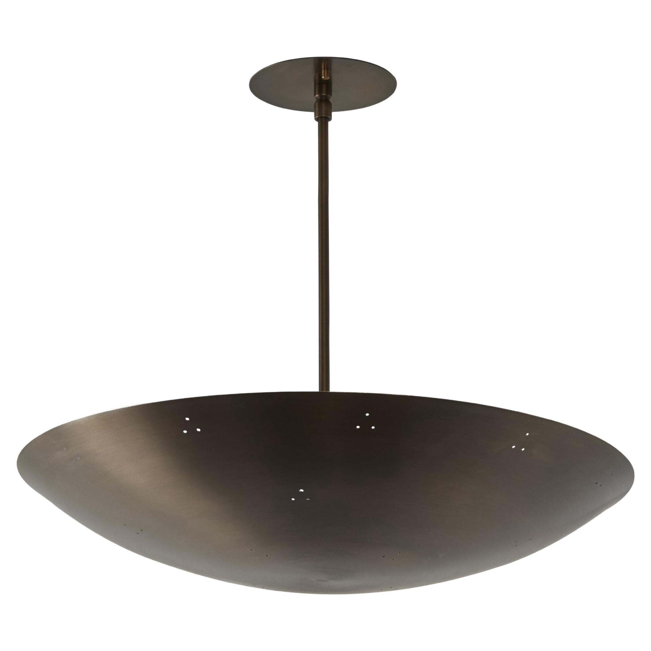 Lampadario a cupola in ottone patinato traforato 'Rey 20' di Raul Reyes