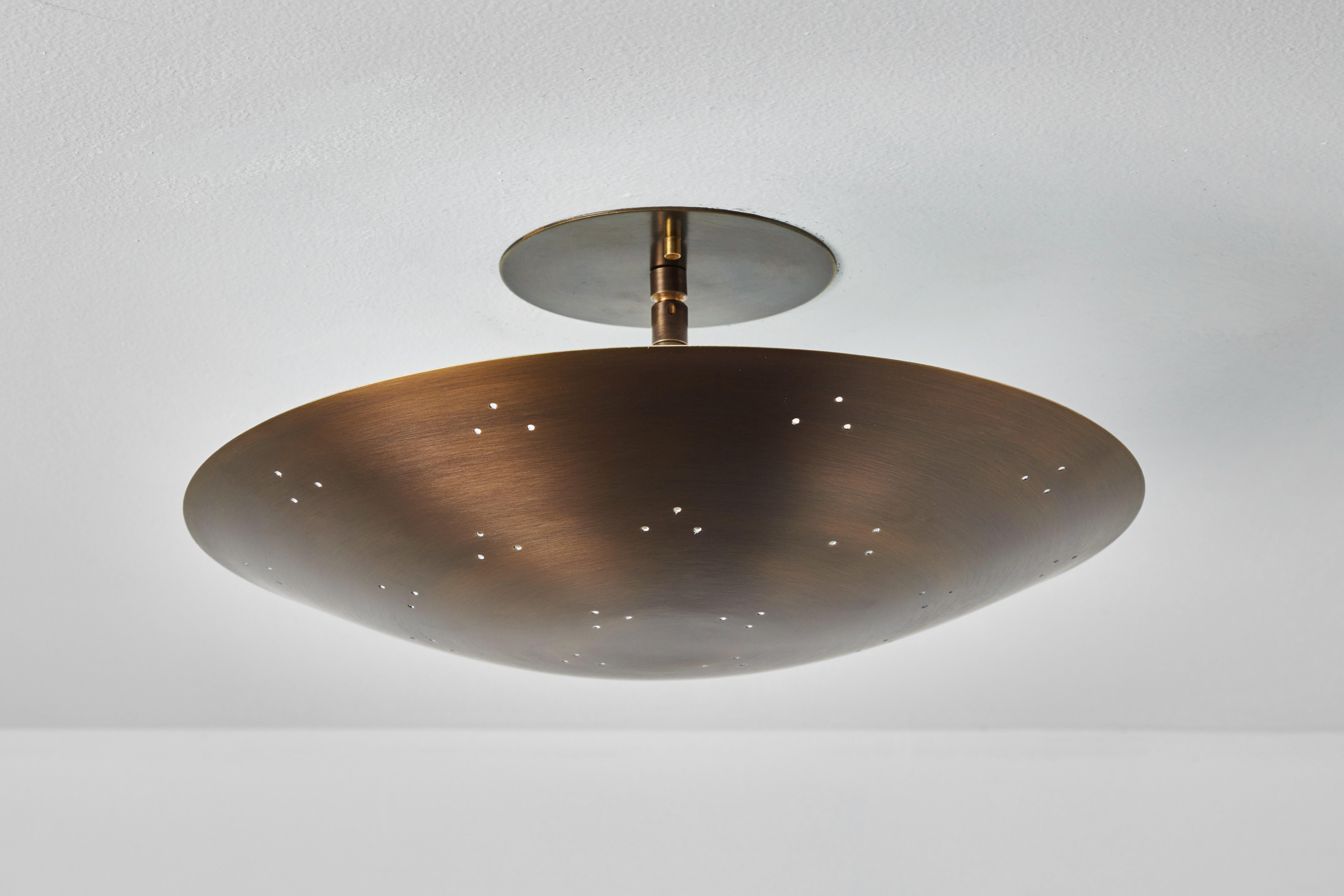 Mid-Century Modern Two Enlighten 'Rey' Perforated Patinated Brass Dome Ceiling Lamp For Sale