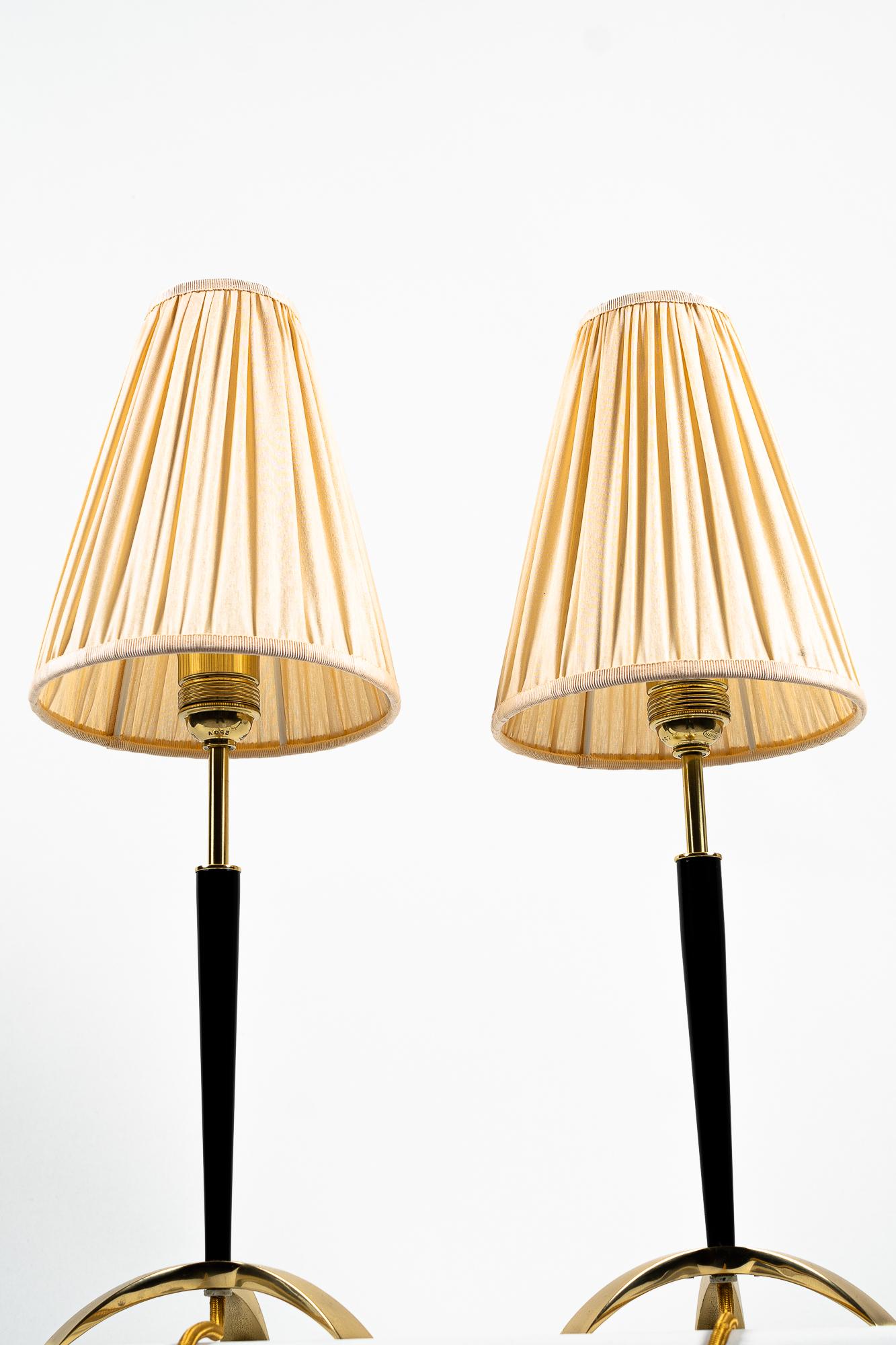 Two extendable table lamps by J.T. Kalmar, circa 1950s
Extendable in the hight from 50cm up to 54cm
Brass parts are polished and stove enamelled
The Fabric is replaced ( new )
Pair price.