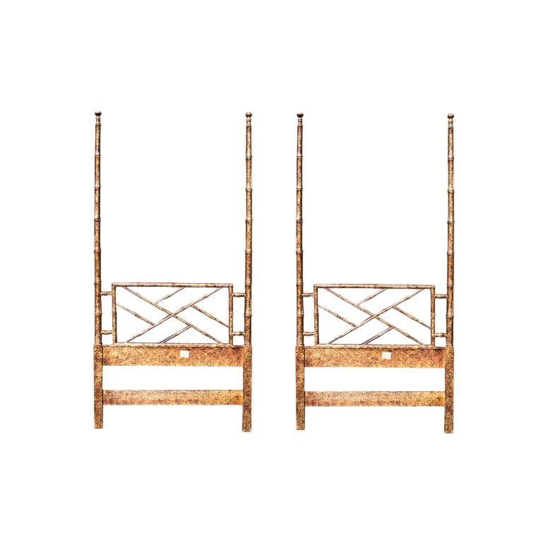 Set of two twin bed headboards (or one twin bed with matching footboard and headboard) in a beautiful faux tortoise shell bamboo finish with matching mirror. Each headboard is in a chinoiserie bamboo design with tall bed posts. 

The posts of the