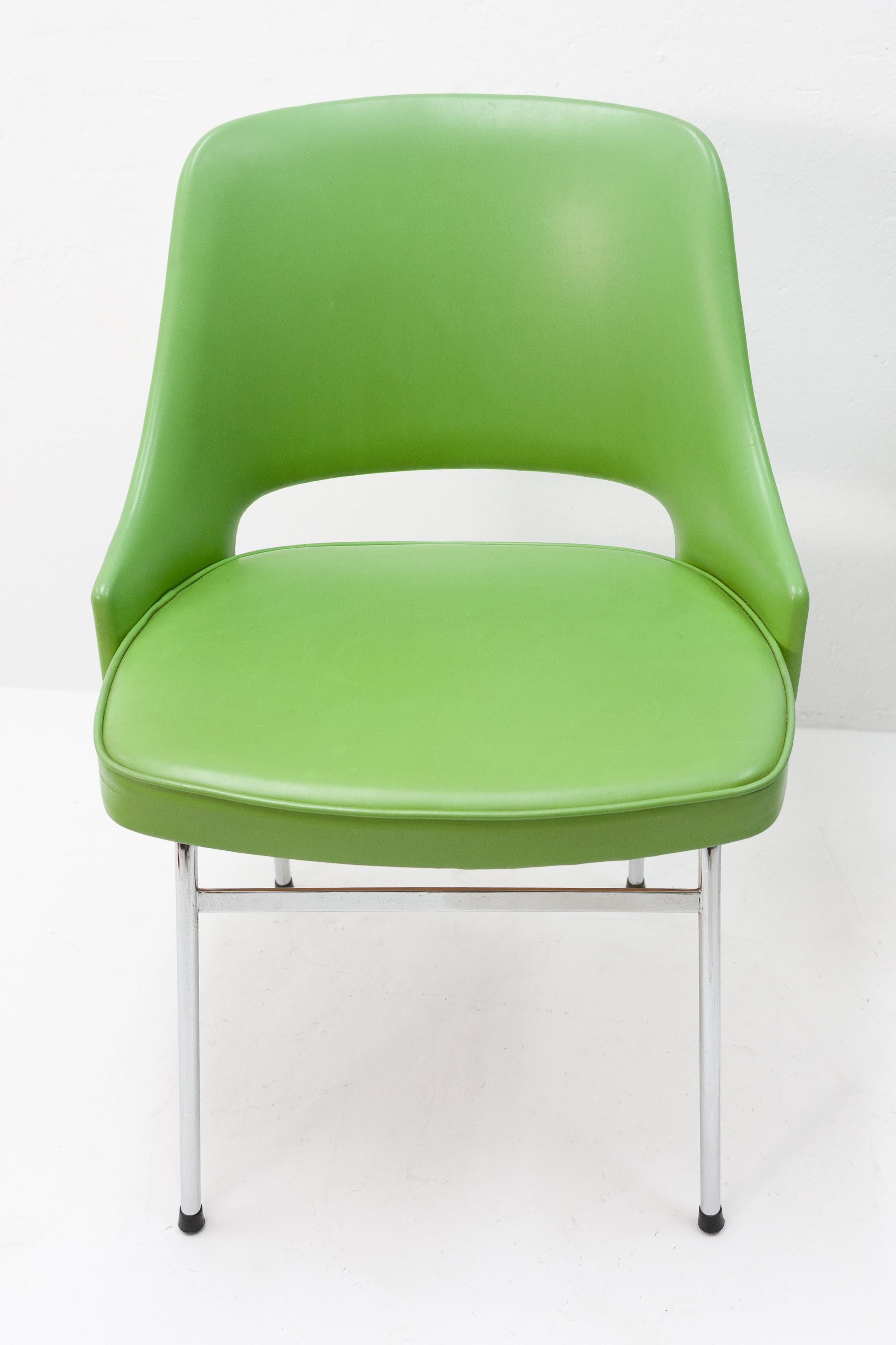 Two FM32 chairs  Very nice designed chairs, By Cees Braakman  for Pastoe   in a apples green color. Trimmed width head nails ,All original 1950s good condition 

